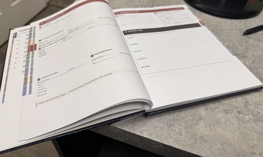 The Build Book open at an angle, showing its thickness